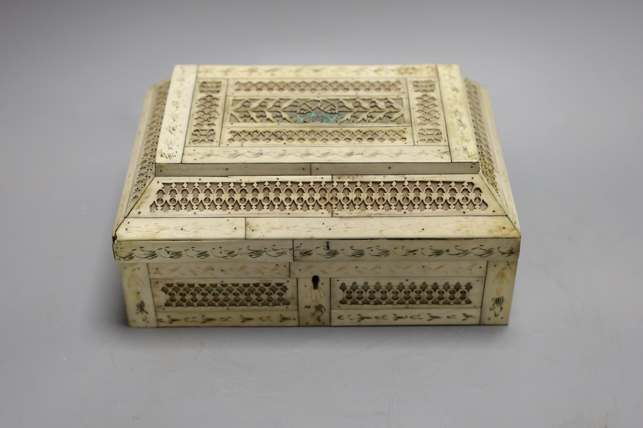 A 19th century prisoner of war fretted bone box, 21.5cm wide